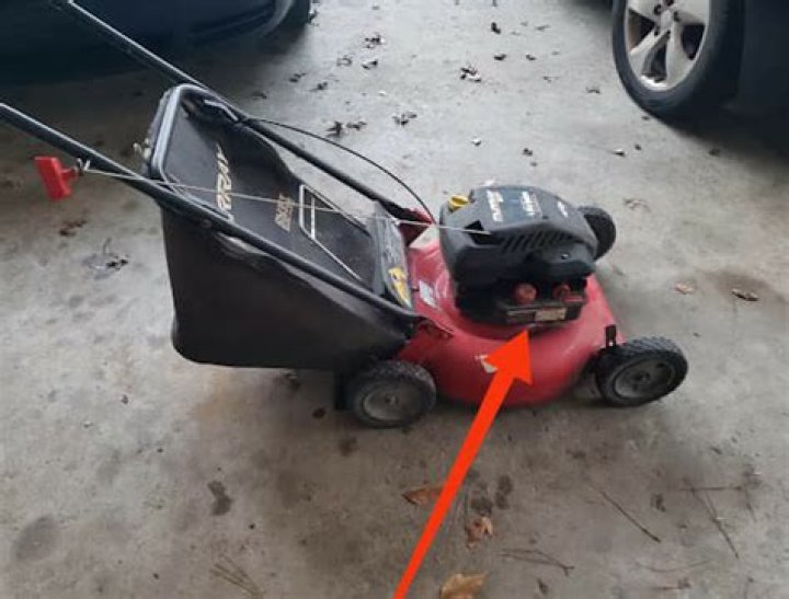where is the carburetor on a lawn mower